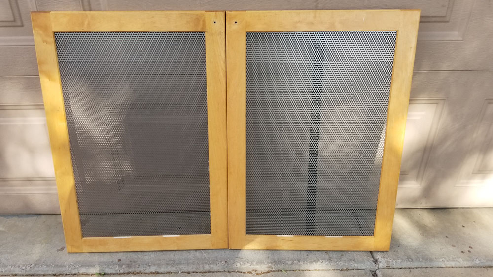 Custom steel inserts for cabinet